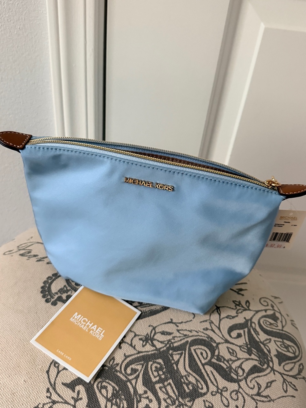 Michael Kors Powder Blue Nylon Clutch bag with Gold Hardware